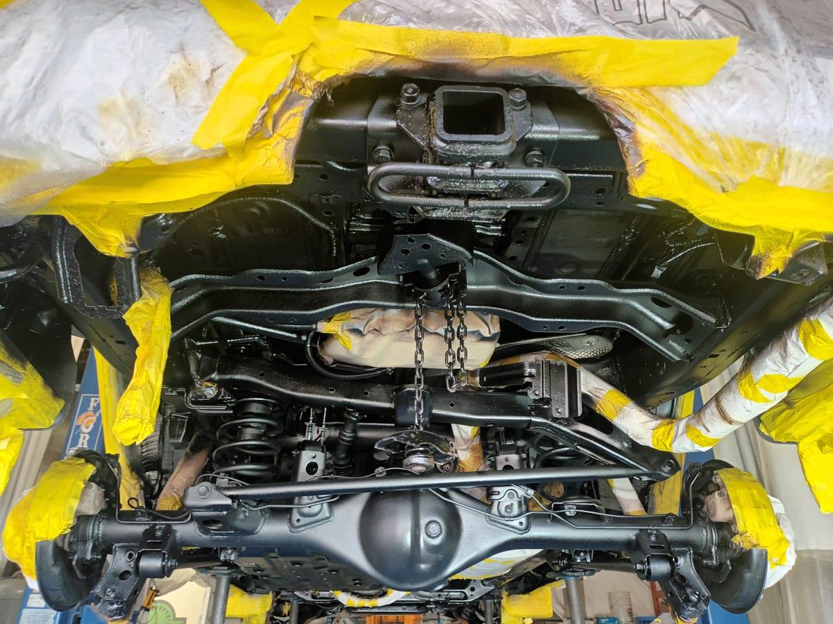 Dinitrol ML + 4941 applied to a masked 4Runner underbody on the lift